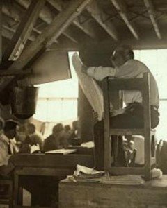 Cigar factory reader in Tampa, Florida, photographed by Lewis Wickes Hines, 1909. (Library of Congress Prints and Photographs Division)